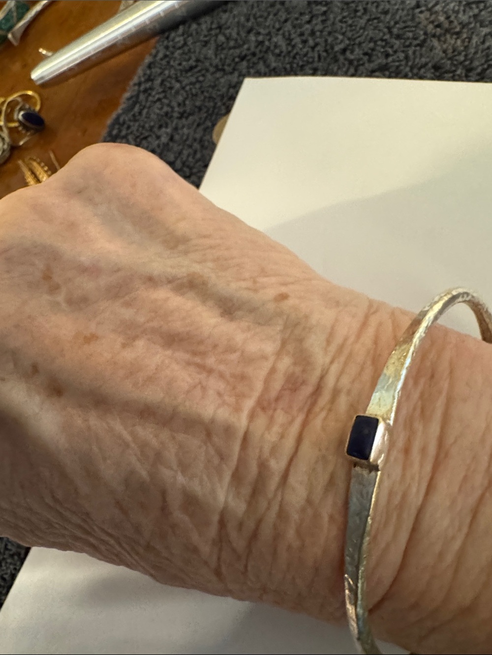 Sterling Silver Bangle with Dark Blue Stone Accent